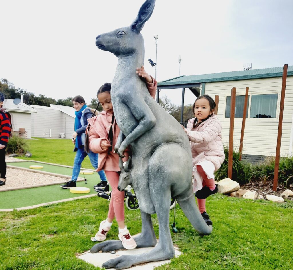 Playing with the native animals on a Church Camp.